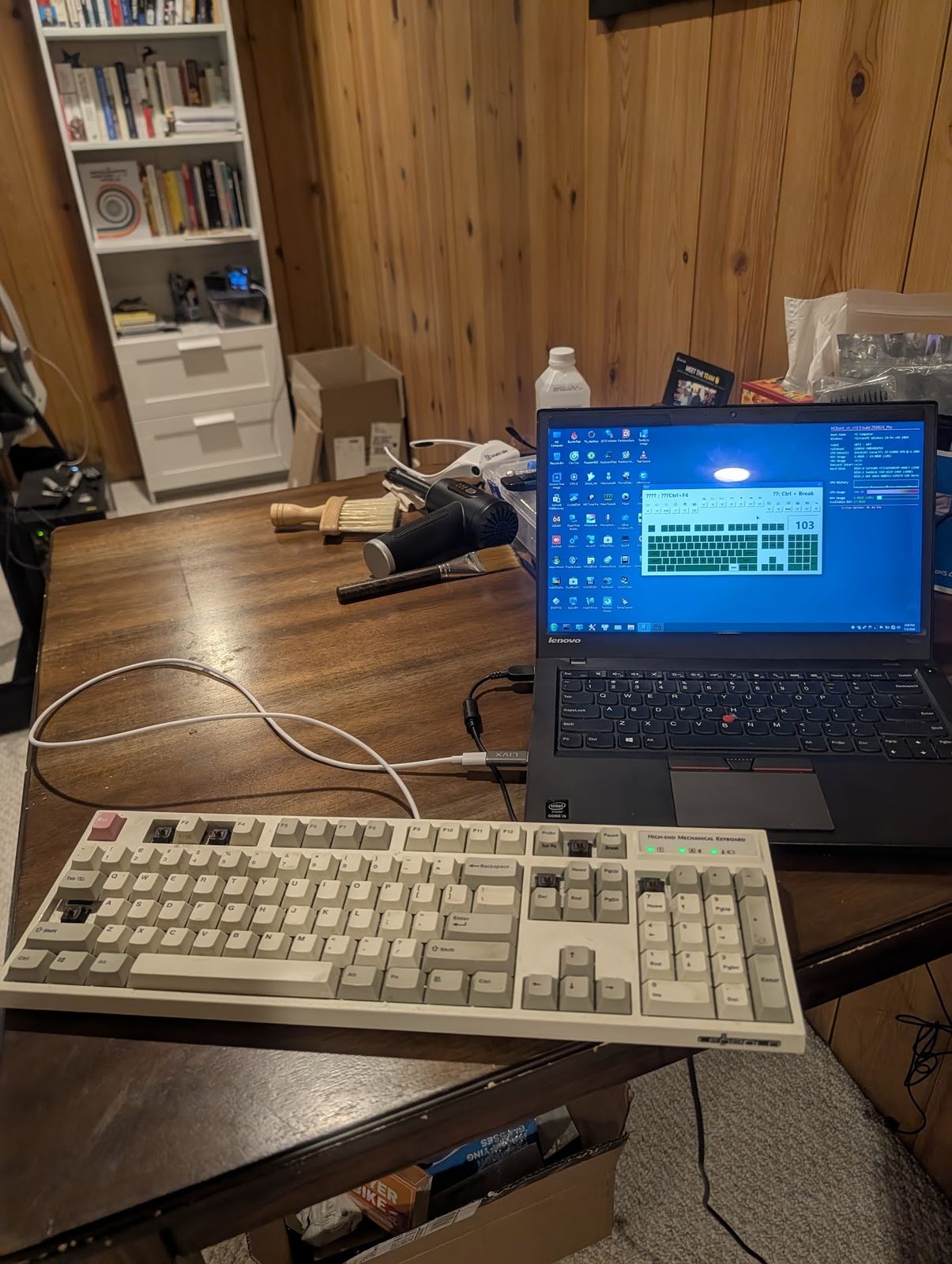 Keyboard connected to a computer running a per-key test — 103 keys registered